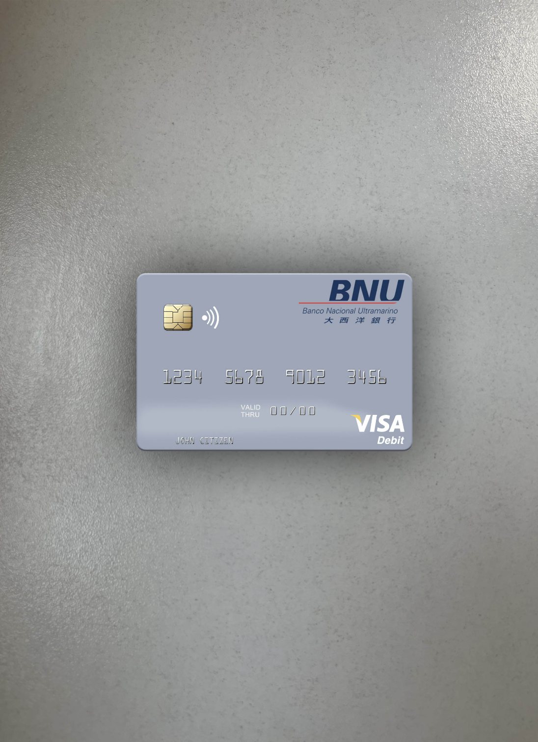 Download Timor Leste Banco Nacional Ultramarino building visa debit card photolook front Photoshop template